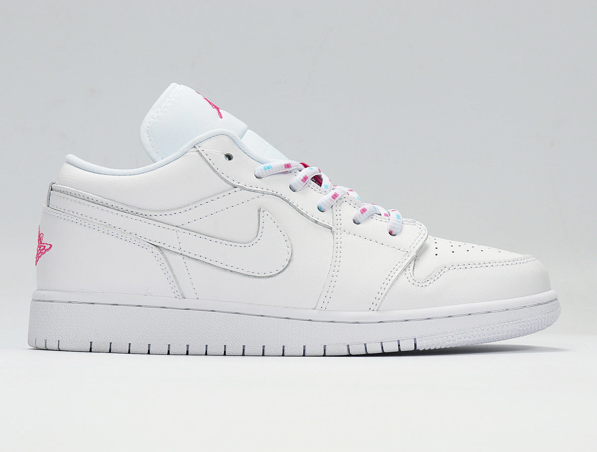 Air Jordan 1 Low White and Pink Sneakers - product image from the listing.