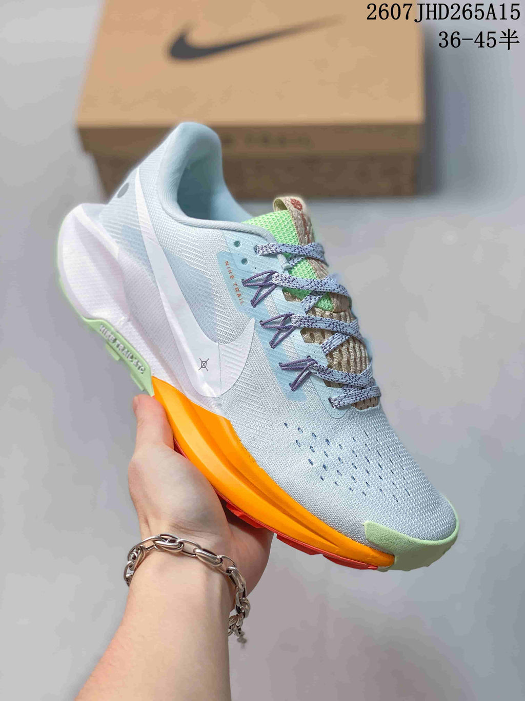 Nike Pegasus Trail 5 Trail Running Shoes in Blue Lime Orange - product image from the listing.