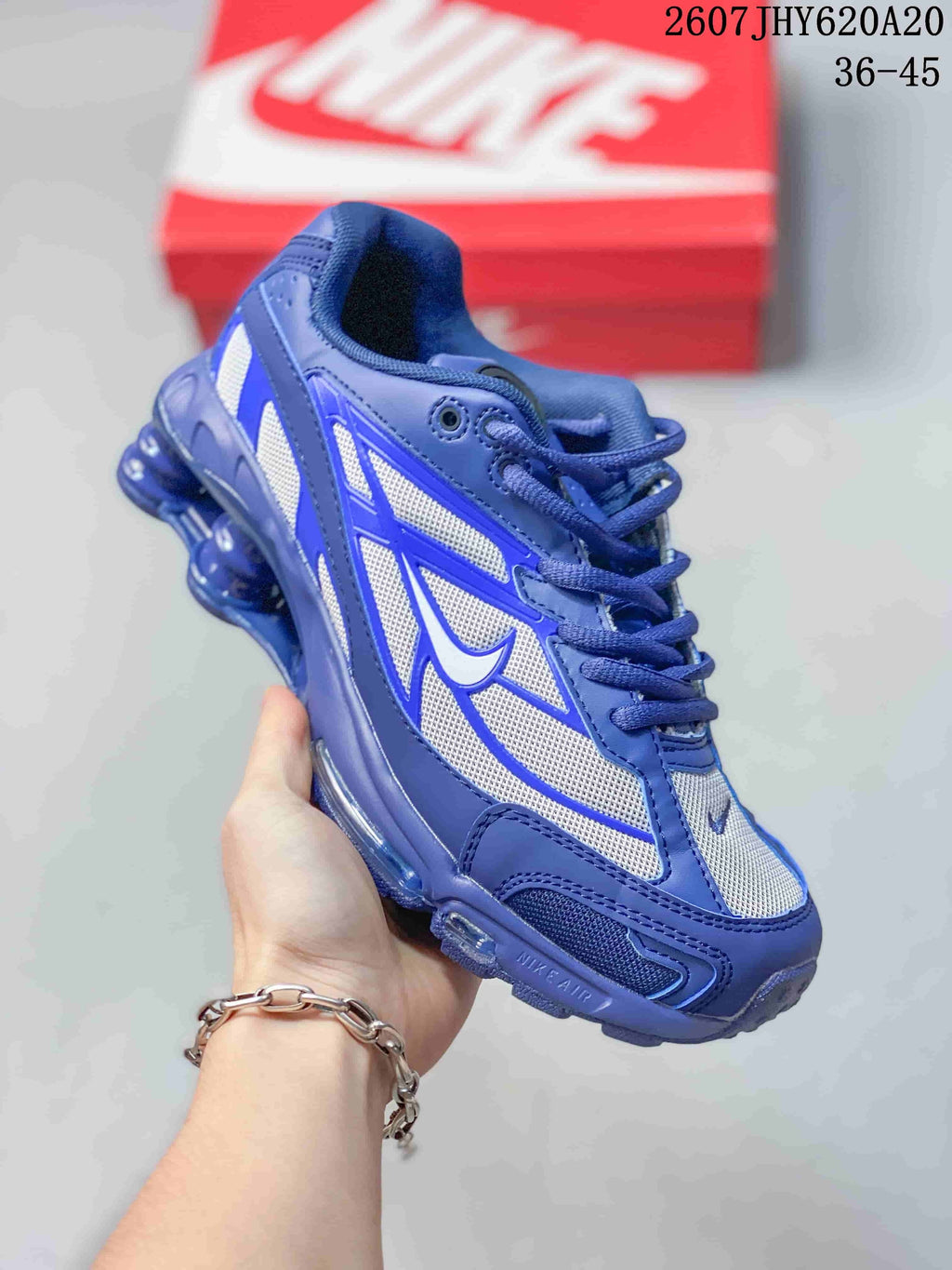 Nike Shox Ride 2 Sneakers in Blue White IO4296-004 - product image from the listing.