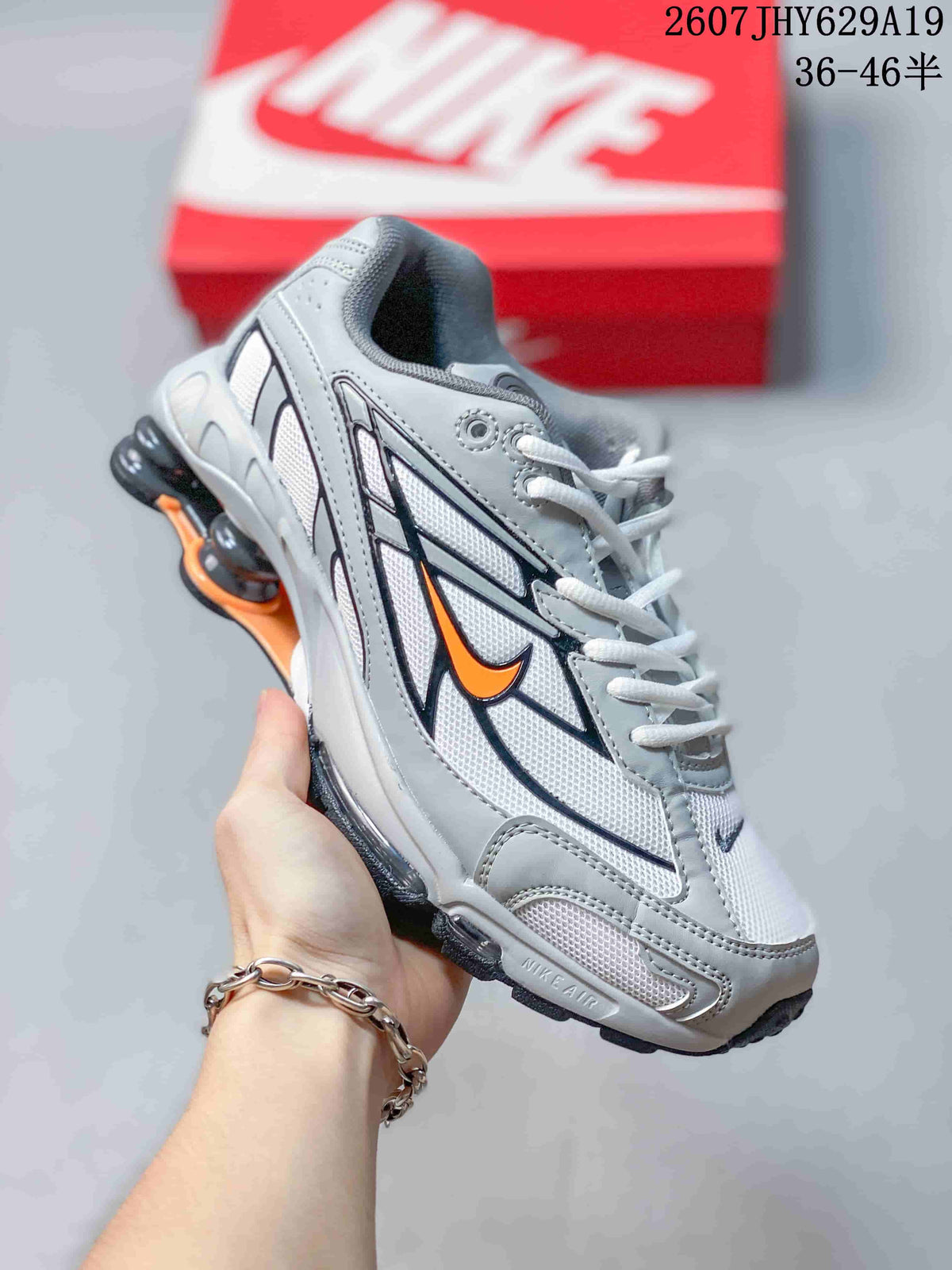 Nike Shox Ride 2 Sneakers in Grey White Orange 711395WPR - product image from the listing.