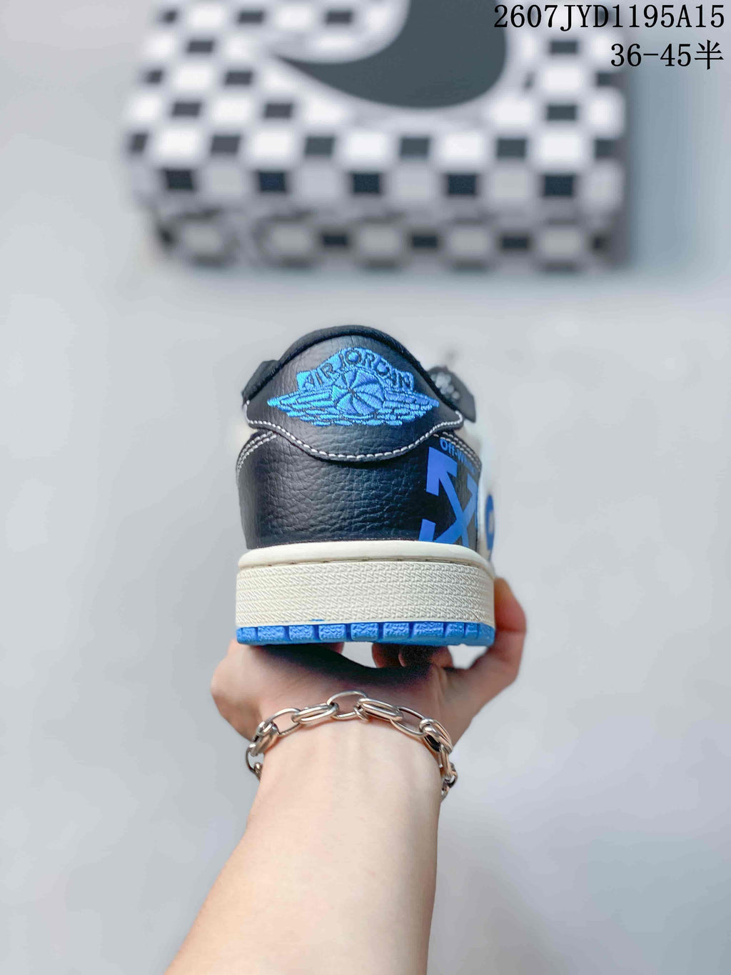 Air Jordan 1 Low White Black Blue Sneakers 2607JYD1195A15 - product image from the listing.