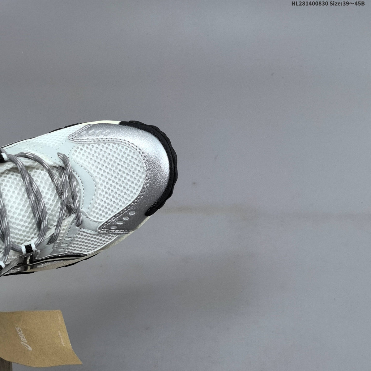 ASICS GEL-NANDI NR Running Sneakers in White Silver - product image from the listing.