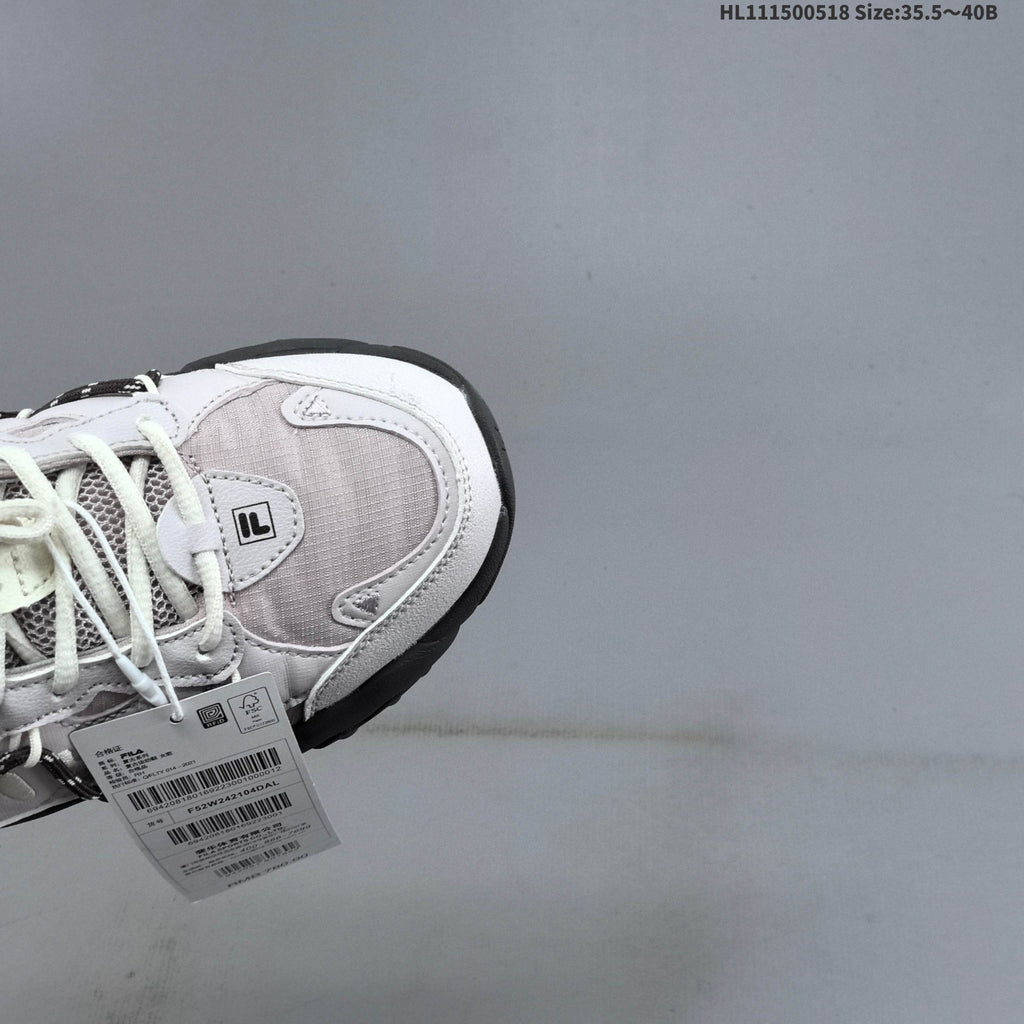 FILA Fluid 6 Low-Cut Sneakers in White and Lilac - product image from the listing.