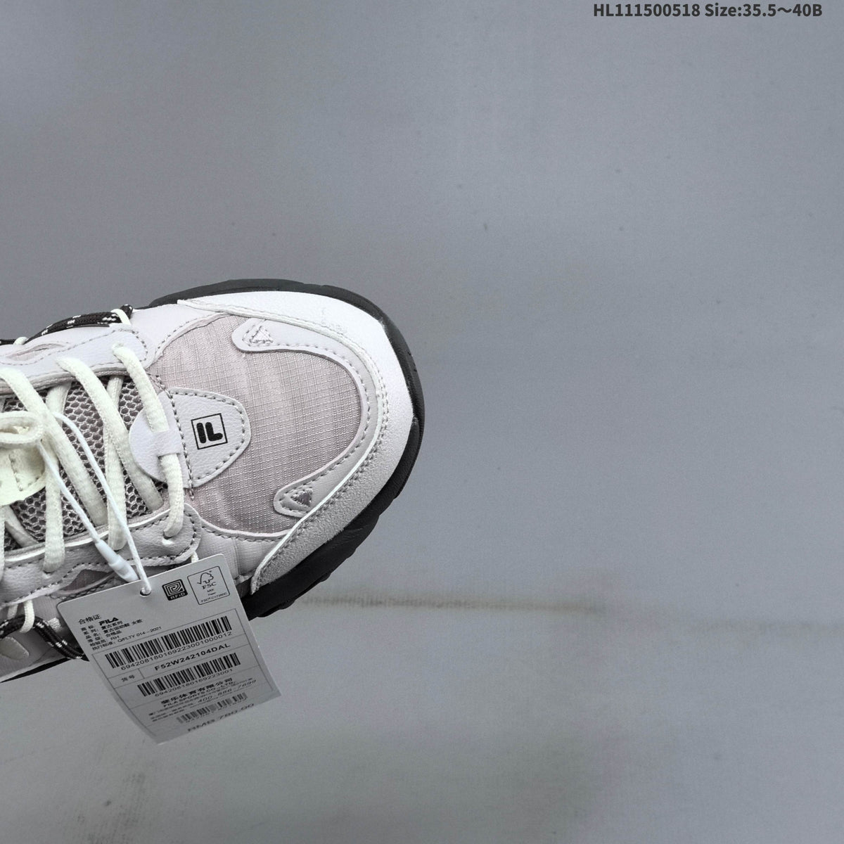 FILA Fluid 6 Low-Cut Sneakers in White and Lilac - product image from the listing.