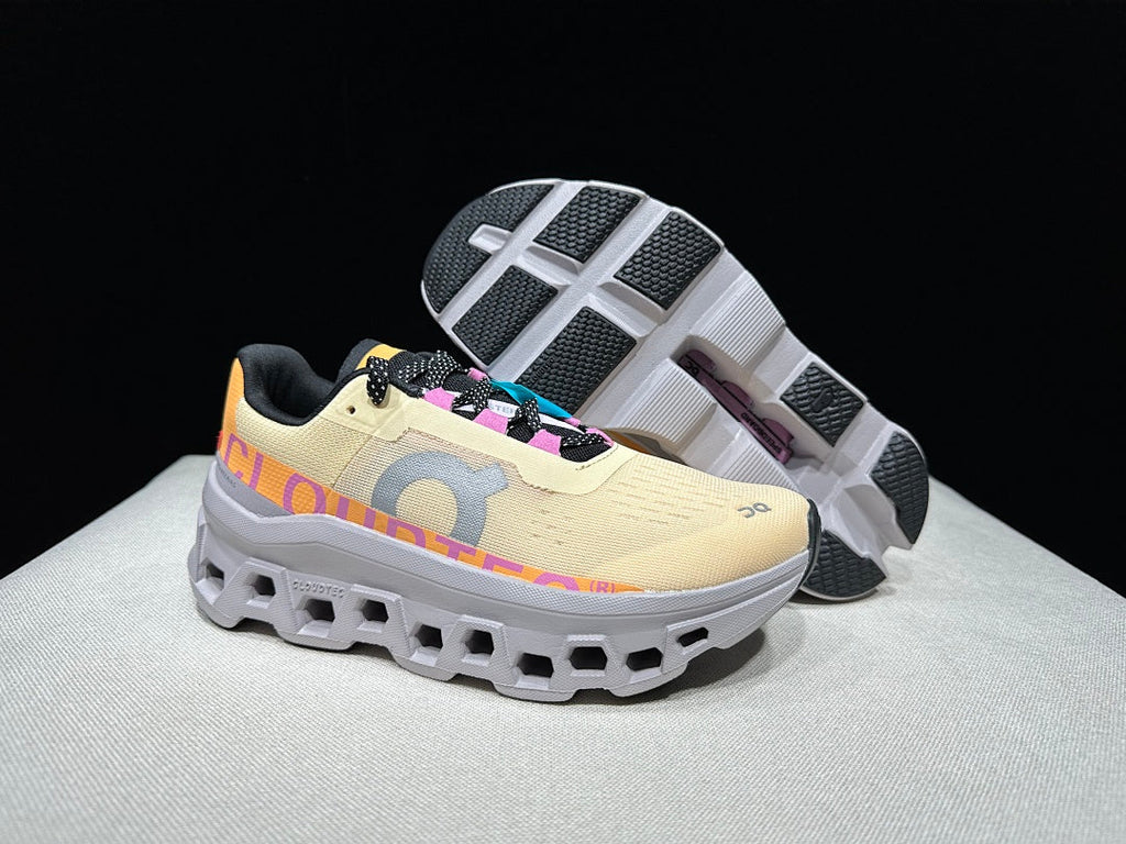 On Cloudmonster Running Shoes, in Pale Yellow and Orange - product image from the listing.
