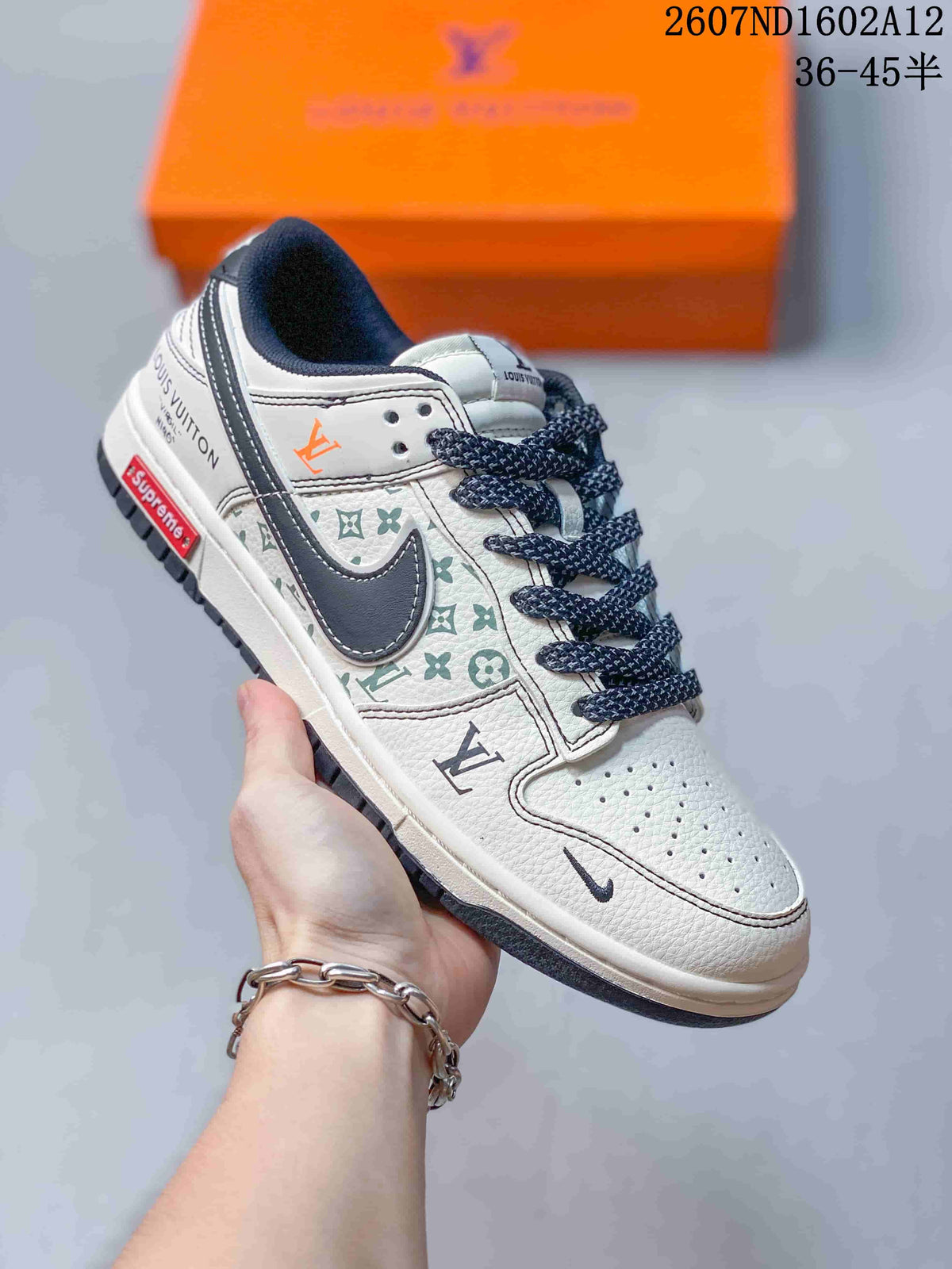 Nike SB Dunk Low Trainers White Black Red Style 2607ND1602A12 - product image from the listing.