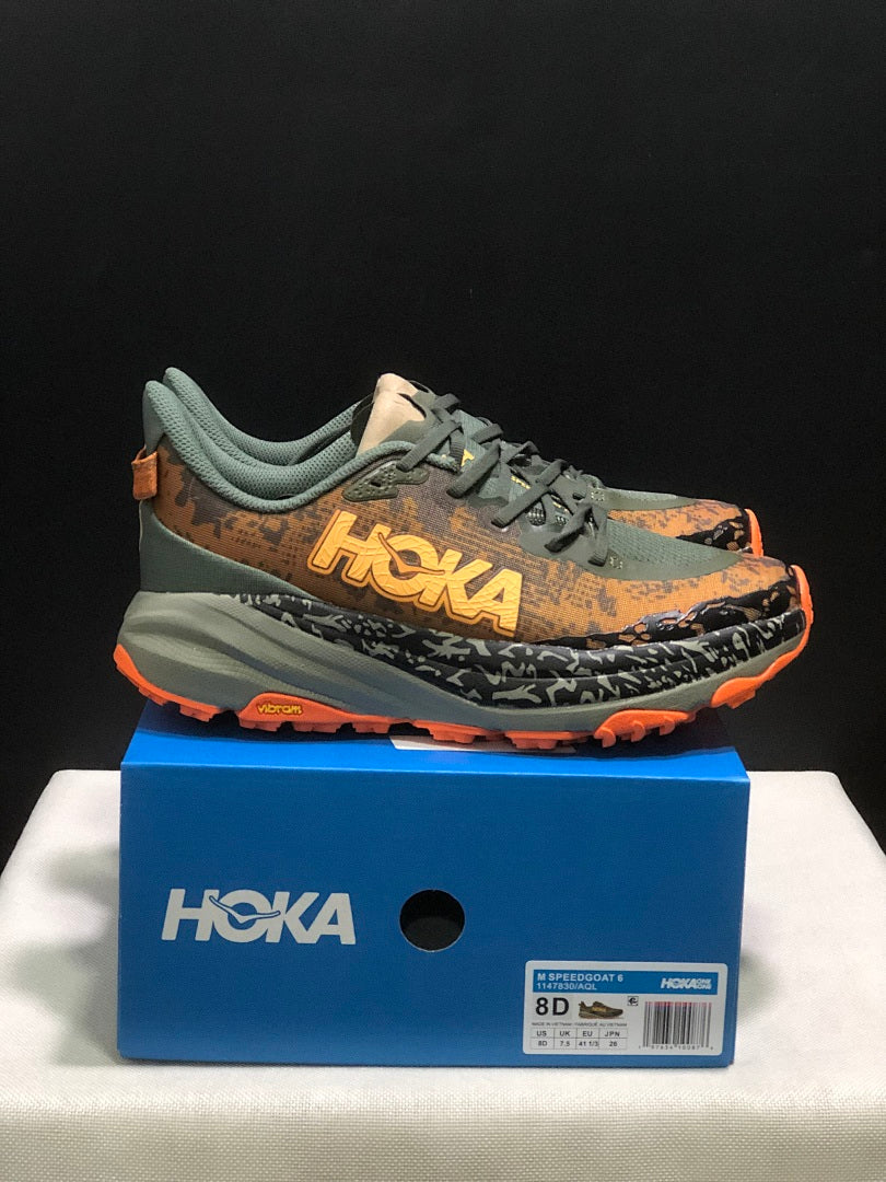 Olive and Orange HOKA Speedgoat 6 Trail Running Shoes - product image from the listing.