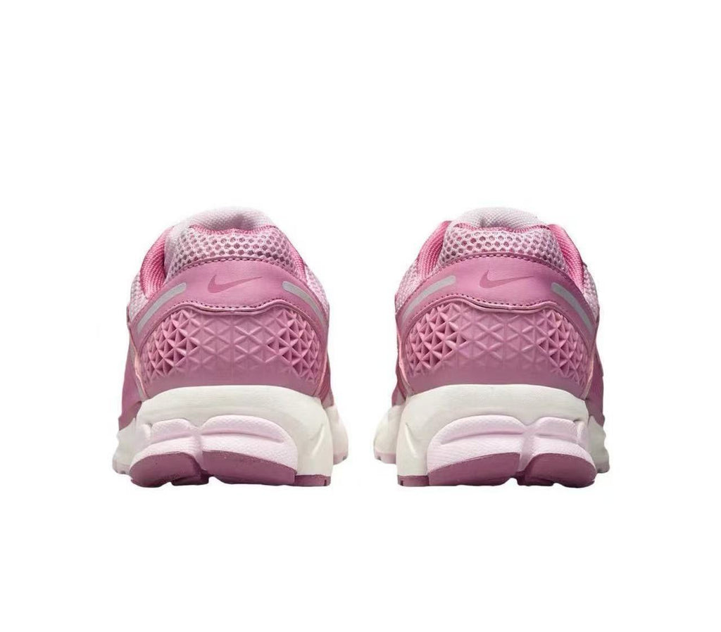 Nike Zoom Vomero 5 Sneakers in Pink and White - product image from the listing.