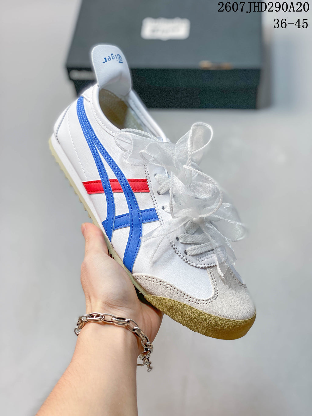 Onitsuka Tiger MEXICO 66 SD Sneakers in White Blue Red - product image from the listing.