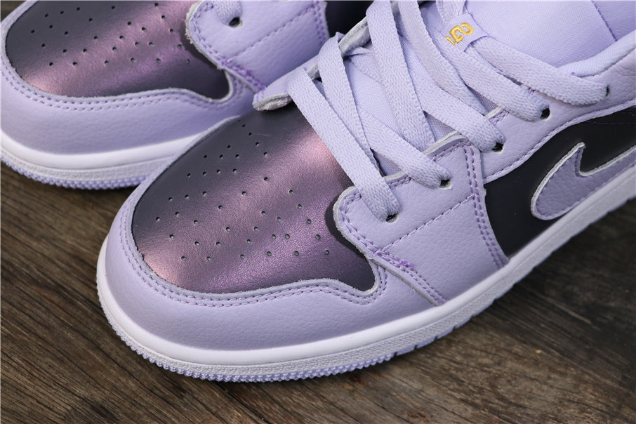 Air Jordan 1 Low GS Oxygen Sneakers in Purple 554723-505 - product image from the listing.