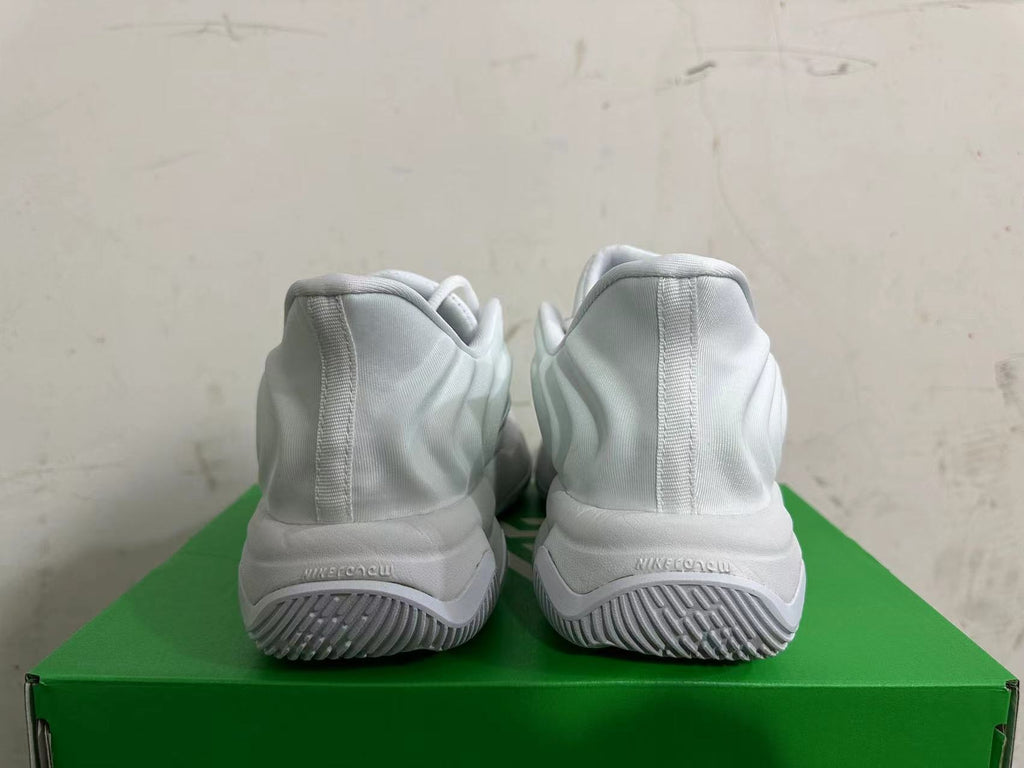 Nike White and Grey Basketball Trainers with Black Accents - product image from the listing.