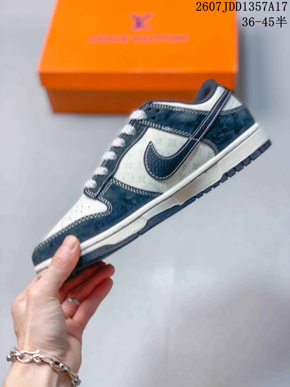 Nike SB Dunk Low Sneakers in Navy and White 2607JDD1357A17 - product image from the listing.