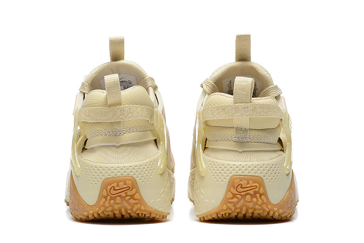 Nike Air Huarache Run Sneakers in Cream and Gum - product image from the listing.