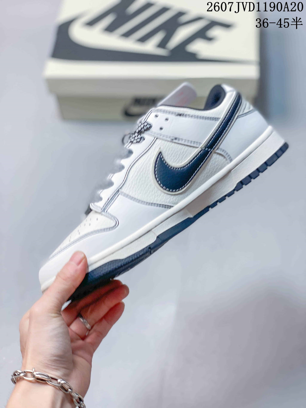 Nike SB Dunk Low Low-Top Sneakers in Off-White Black - product image from the listing.