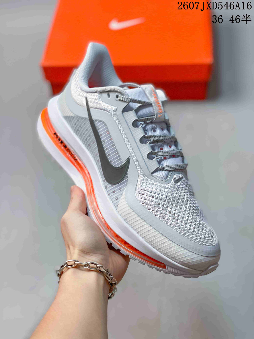 Nike Adult Sneakers in White Gray Orange - product image from the listing.