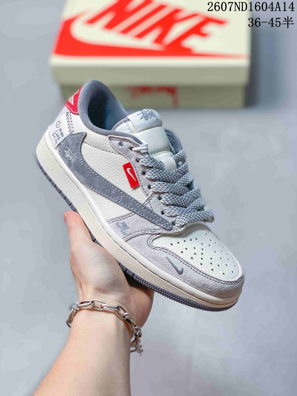 Nike SB Dunk Low Sneakers in Gray and Off-White 2607ND1604A14 - product image from the listing.