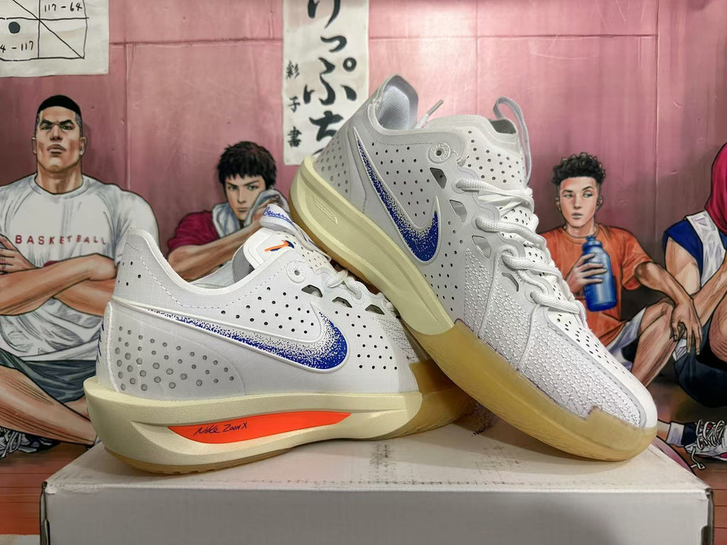 Nike ZoomX Basketball Sneakers in White Blue Orange - product image from the listing.