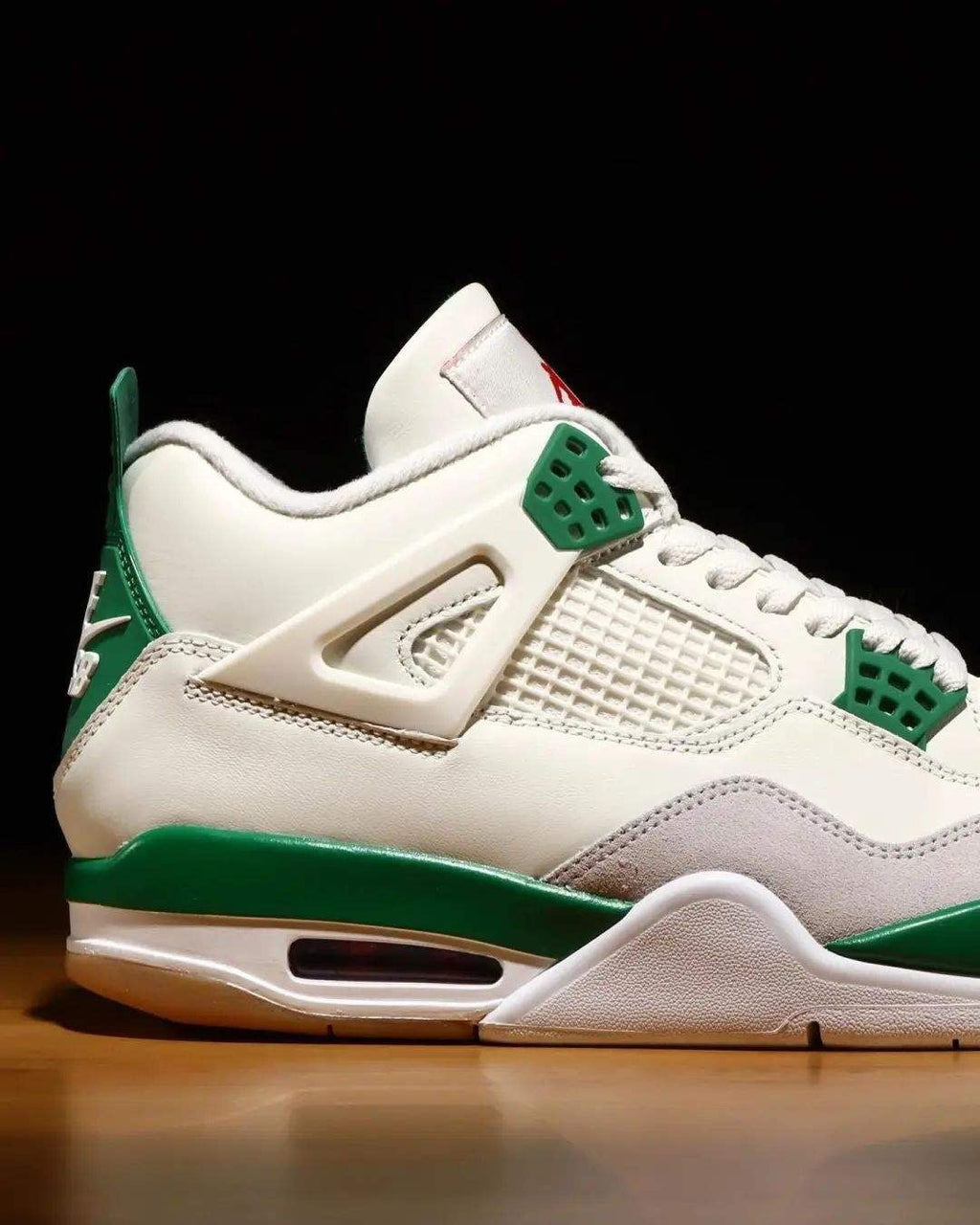 Nike SB x Air Jordan 4 Pine Sneakers in Green DR5415-103 - product image from the listing.