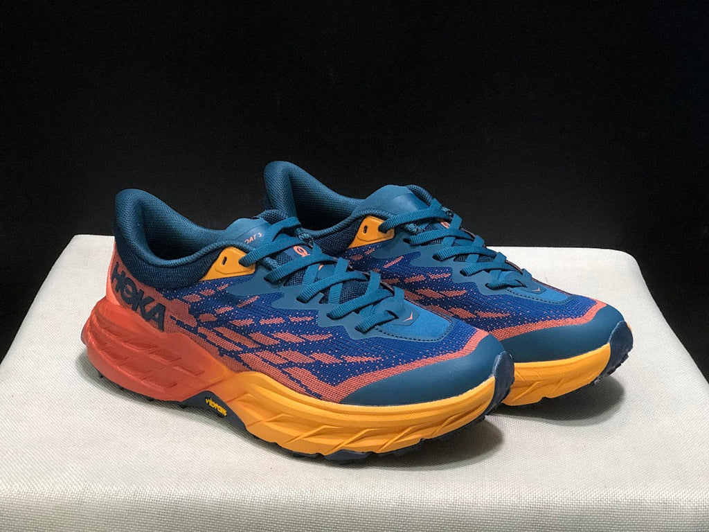 HOKA Speedgoat 5 Trail Running Shoes, in Blue and Orange - product image from the listing.