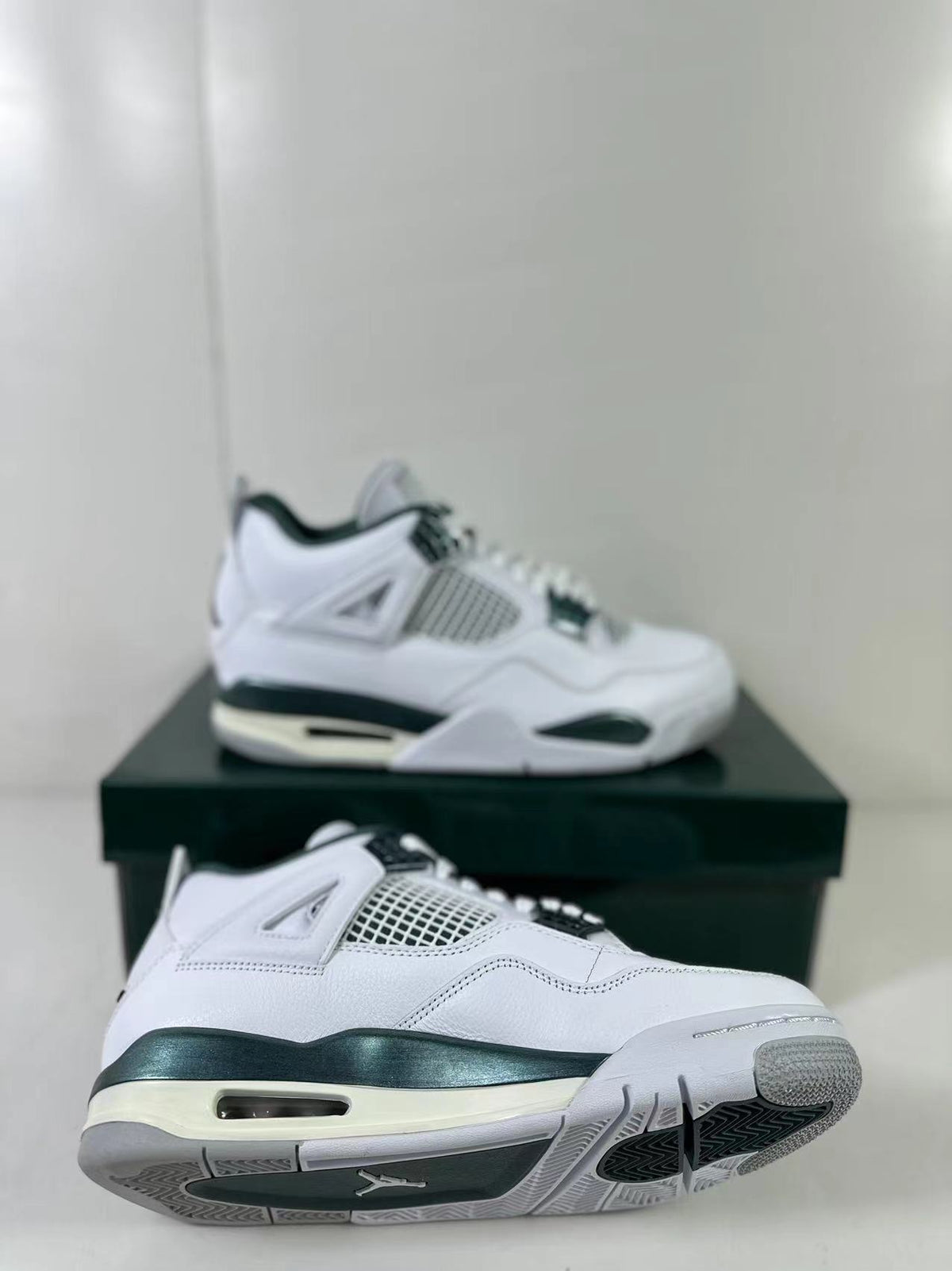 Air Jordan 4 Retro Bucks White Green Sneakers FQ8138-103 - product image from the listing.