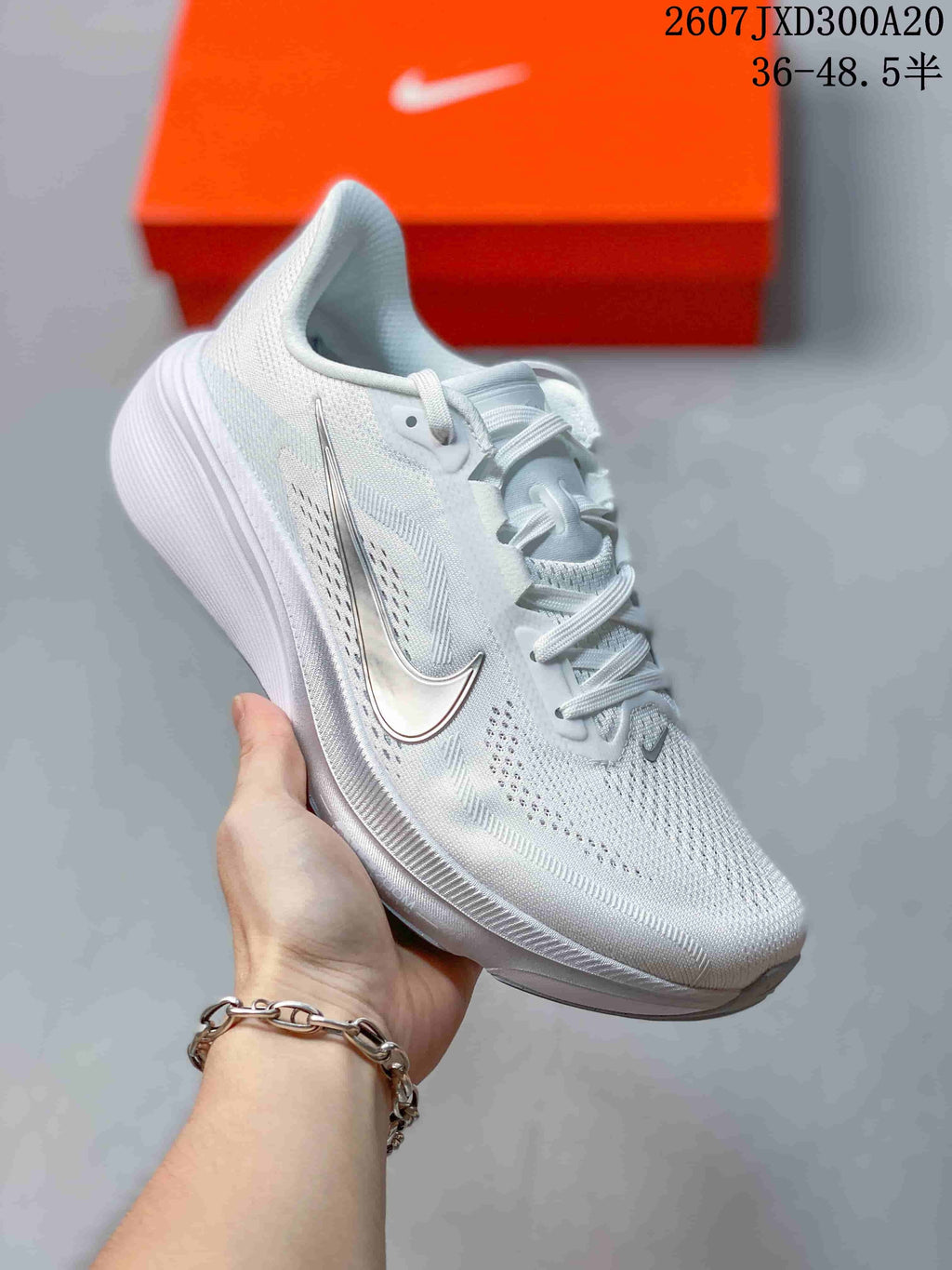 Nike Air Zoom Pegasus 42 Running Sneakers in White JXD300A20 - product image from the listing.