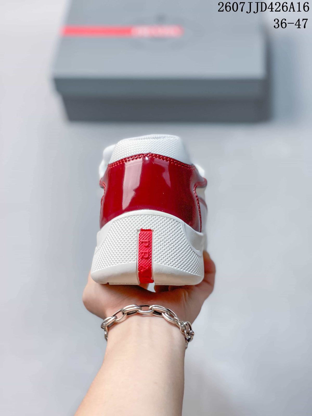 Prada 2607JJD426A16 Red and White Platform Trainers - product image from the listing.