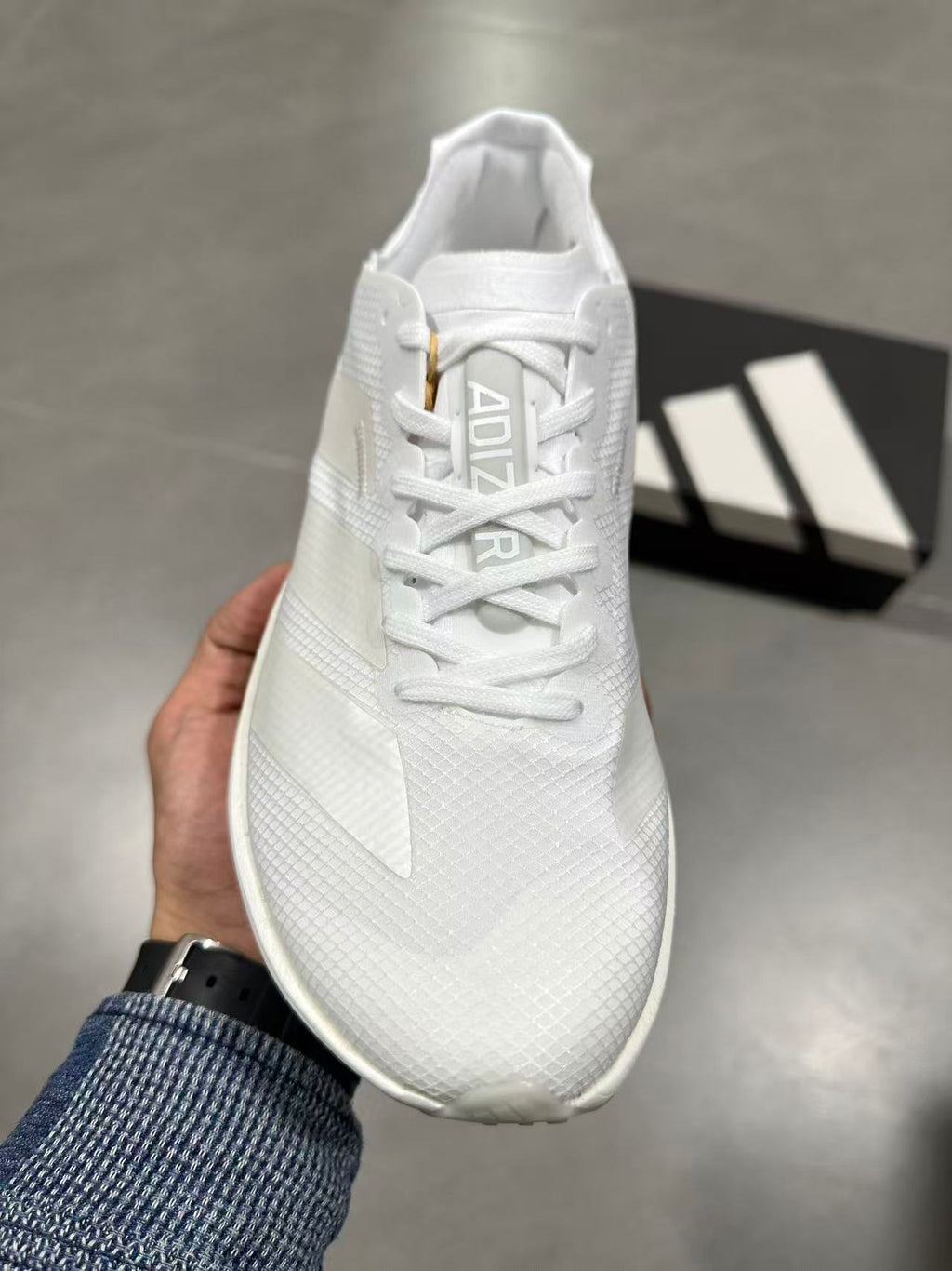 Adidas Adizero Lightstrike Pro Running Shoes in White JR6355 - product image from the listing.