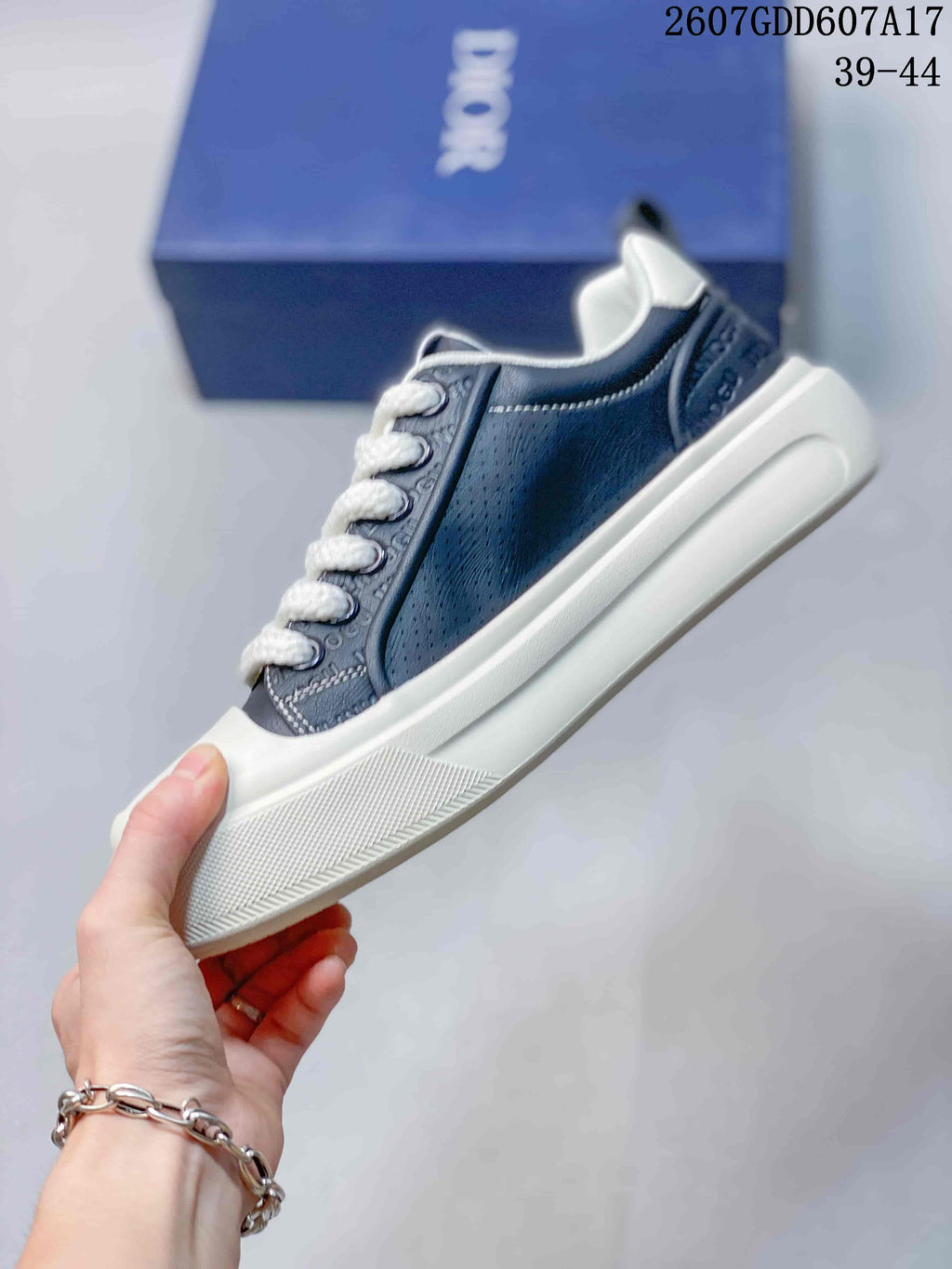 Dior 2607GDD607A17 Low-Top Sneakers in Navy White - product image from the listing.