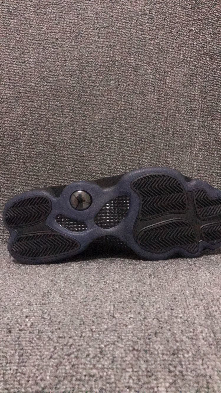 Air Jordan 13 Retro Cap and Gown Sneakers in Black - product image from the listing.