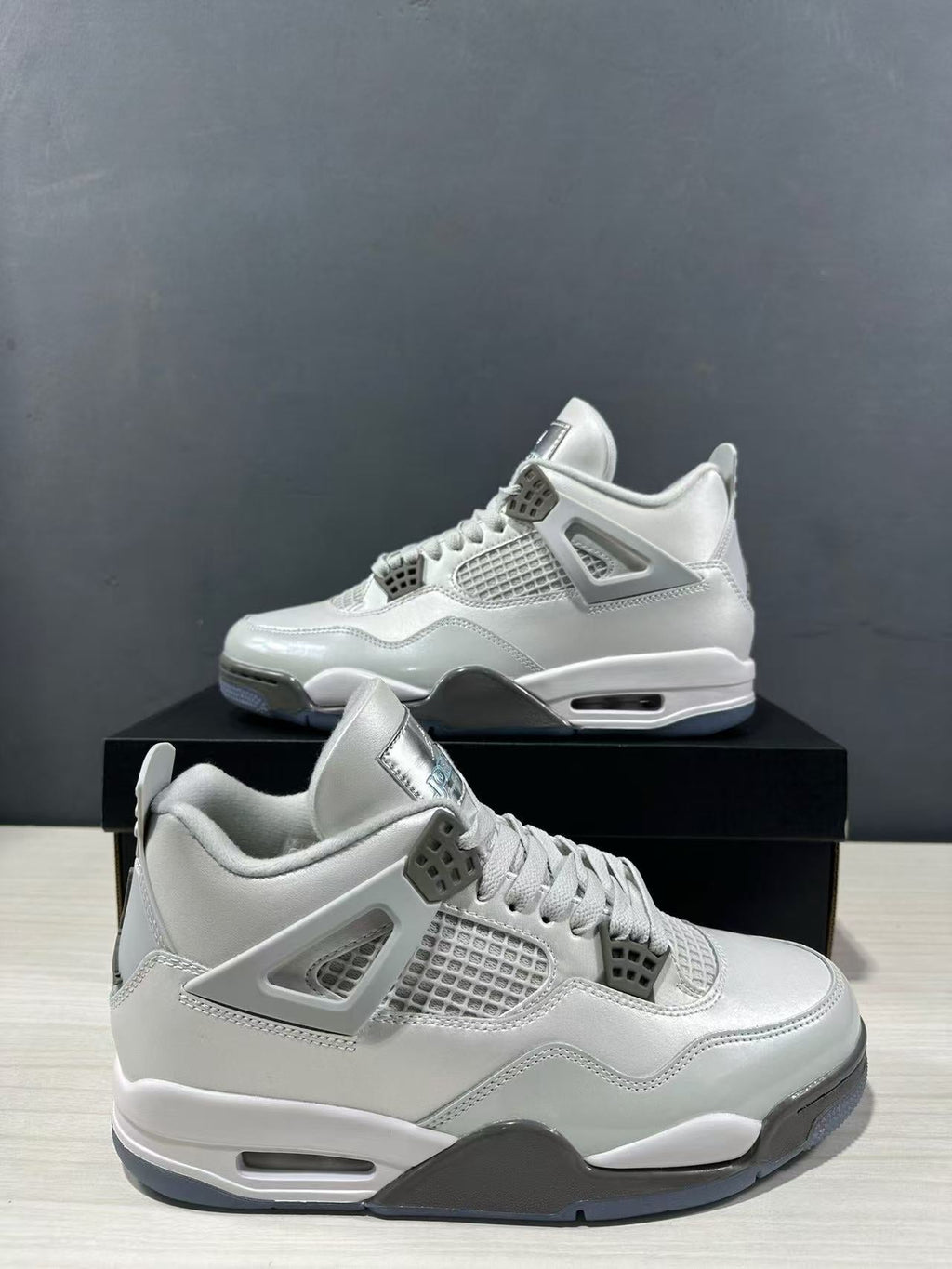 Air Jordan 4 Photon Dust Sneakers HV4401-014 - product image from the listing.