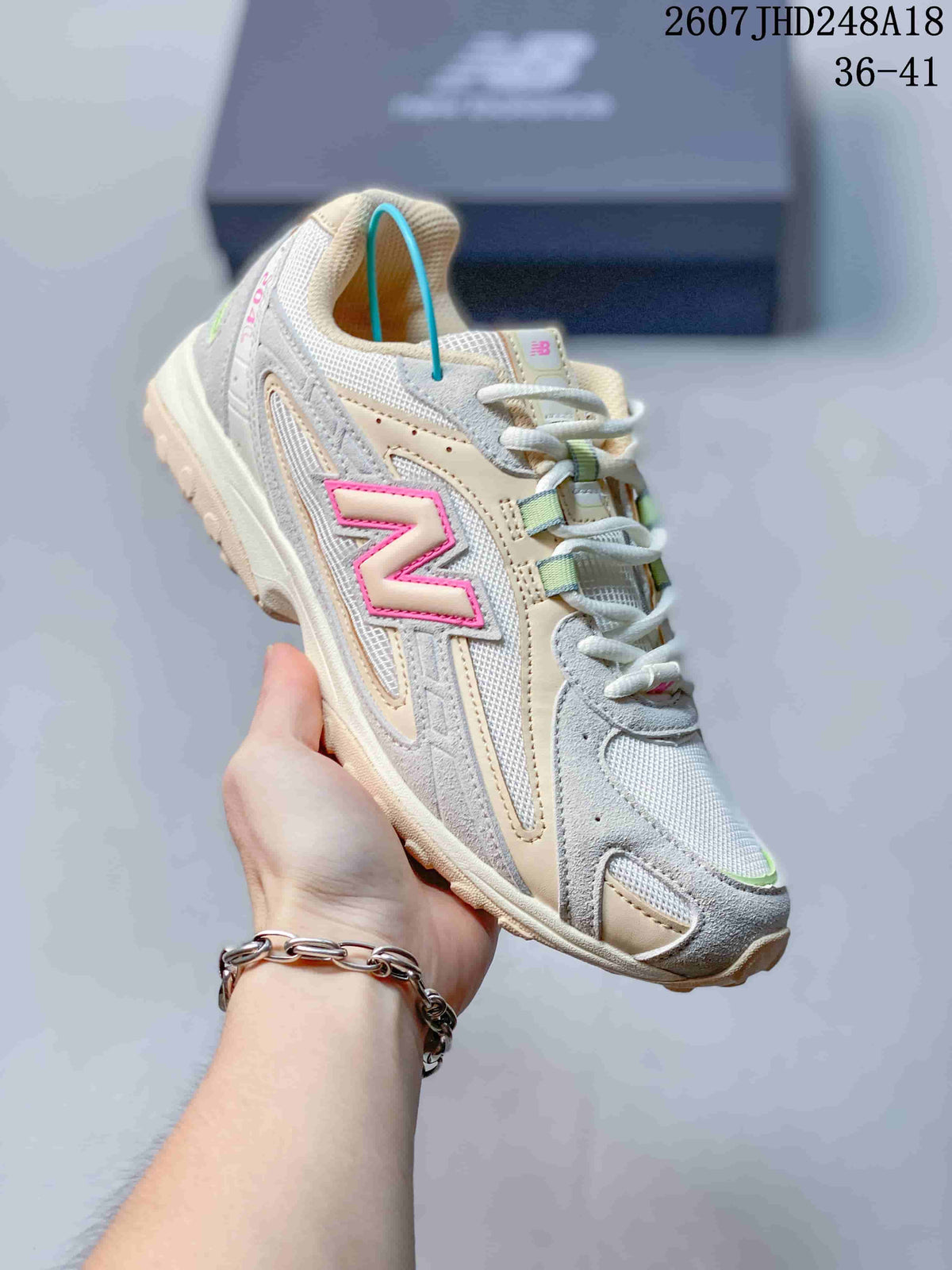 Cream and Gray New Balance 204L Low-Top Sneakers - product image from the listing.
