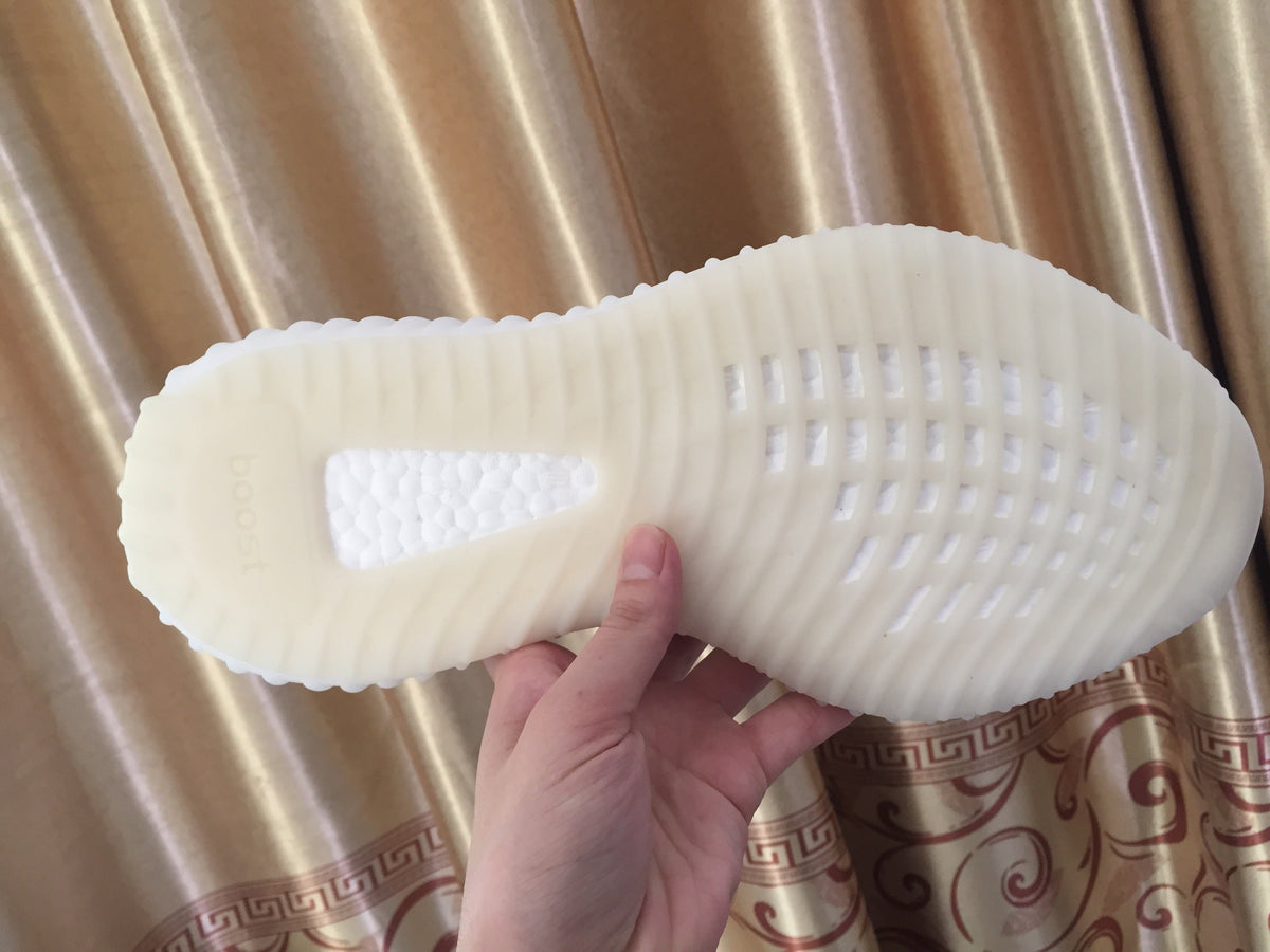 Yeezy 350 V2 Low-Top Sneakers in White Knit - product image from the listing.