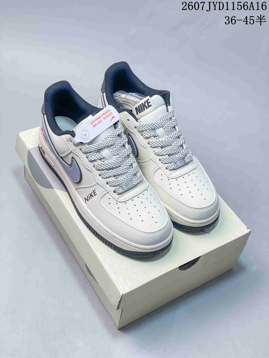 Nike Air Force 1 '07 Low Sneakers in White Grey Black - product image from the listing.