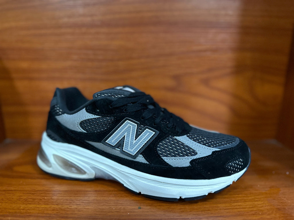 New Balance 530 Sneakers in Black and Silver - product image from the listing.