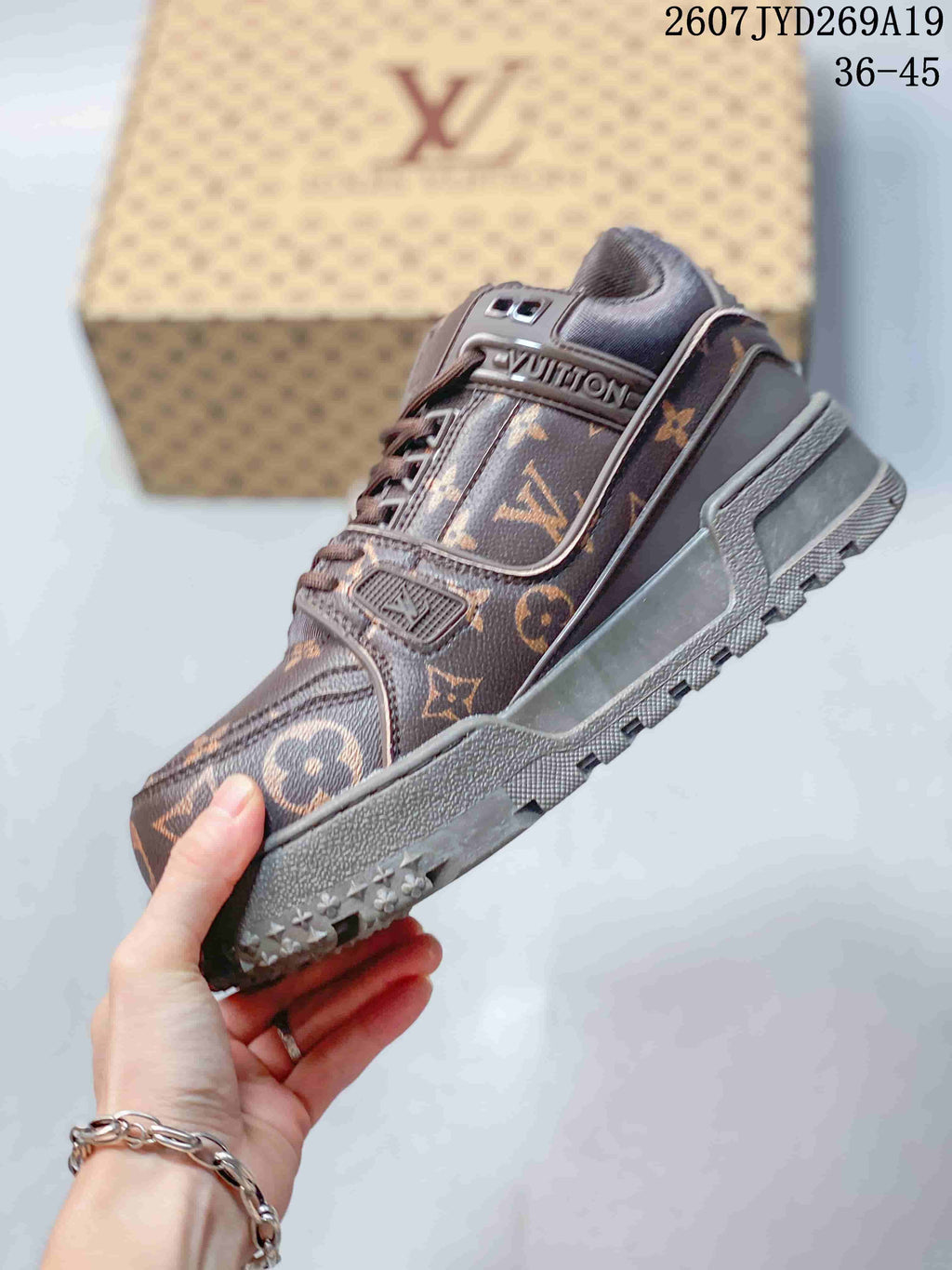 Louis Vuitton Trainer Maxi Low-Top Sneakers in Brown - product image from the listing.