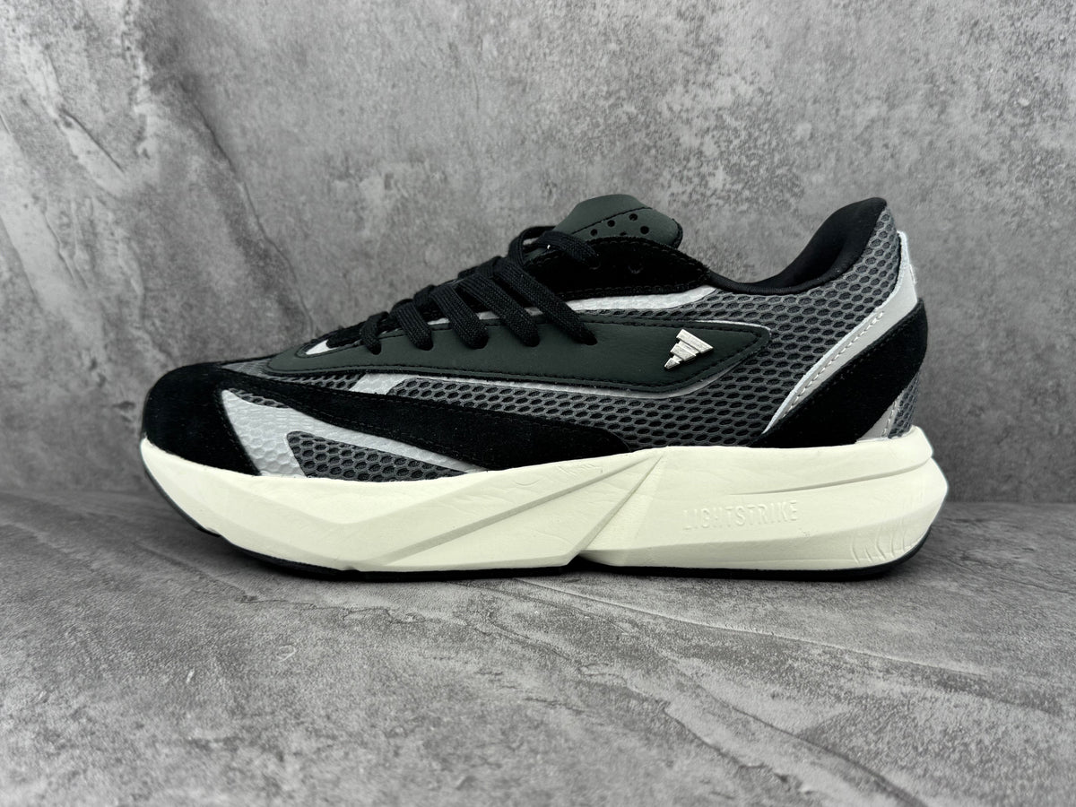 Adidas JH6959 Sneakers in Black and Grey - product image from the listing.