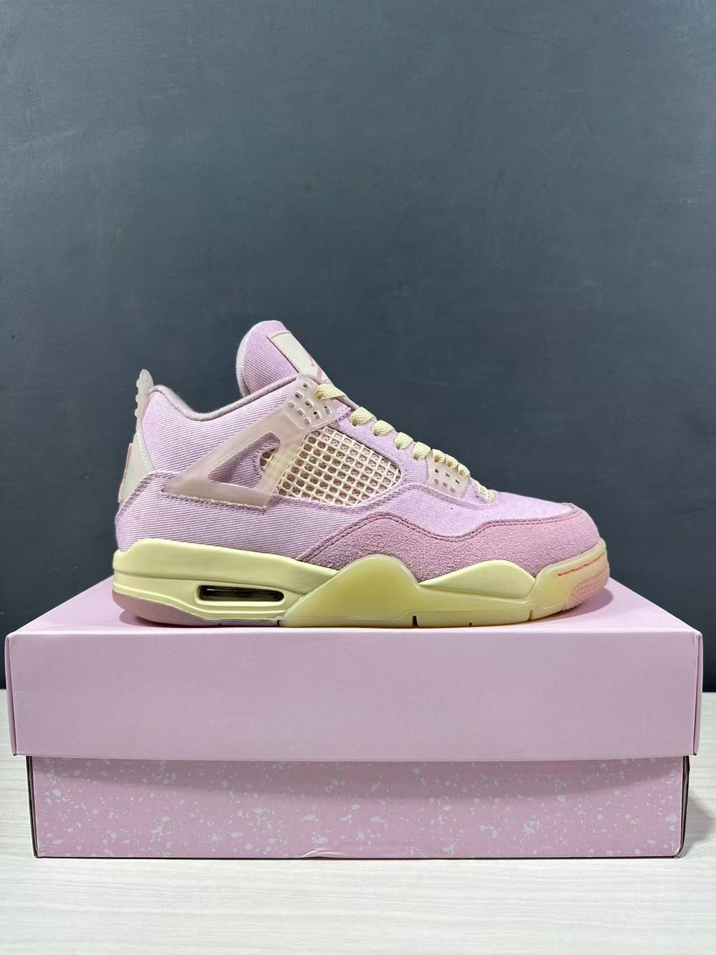 Air Jordan 4 Retro Pink Sneakers IB6716-600 - product image from the listing.