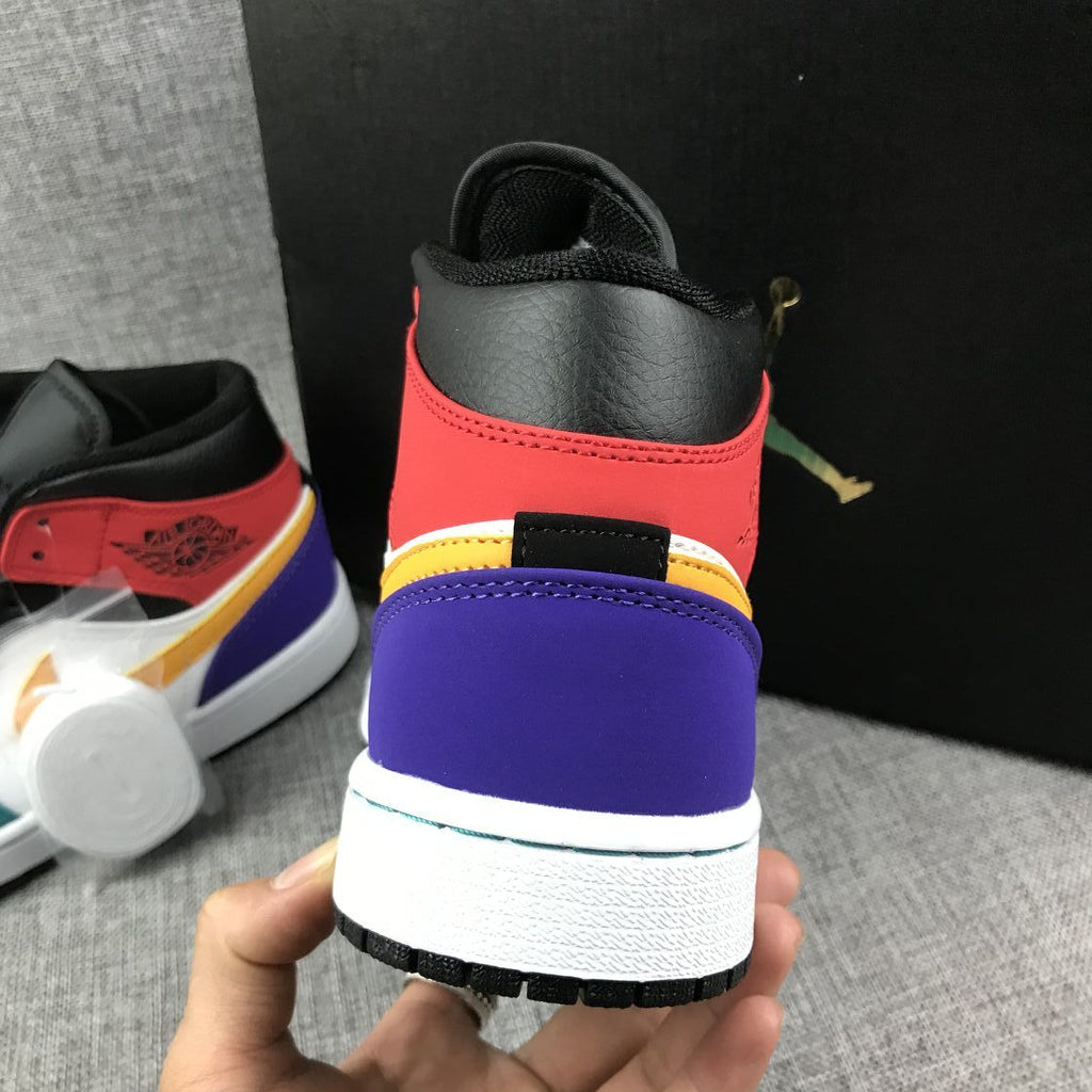 Jordan 1 Mid High-Top Sneakers in Multicolor - product image from the listing.