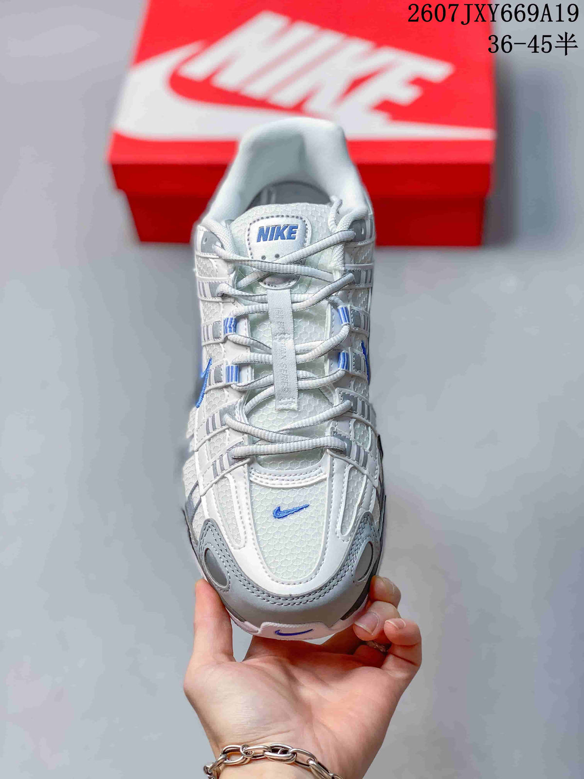 Nike P-6000 Retro Running Sneakers in White Grey Blue - product image from the listing.