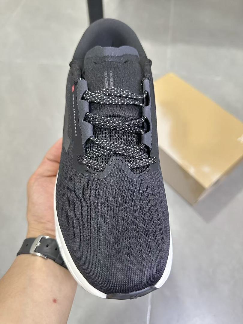 On Running Black and White Road Sneakers for Running - product image from the listing.