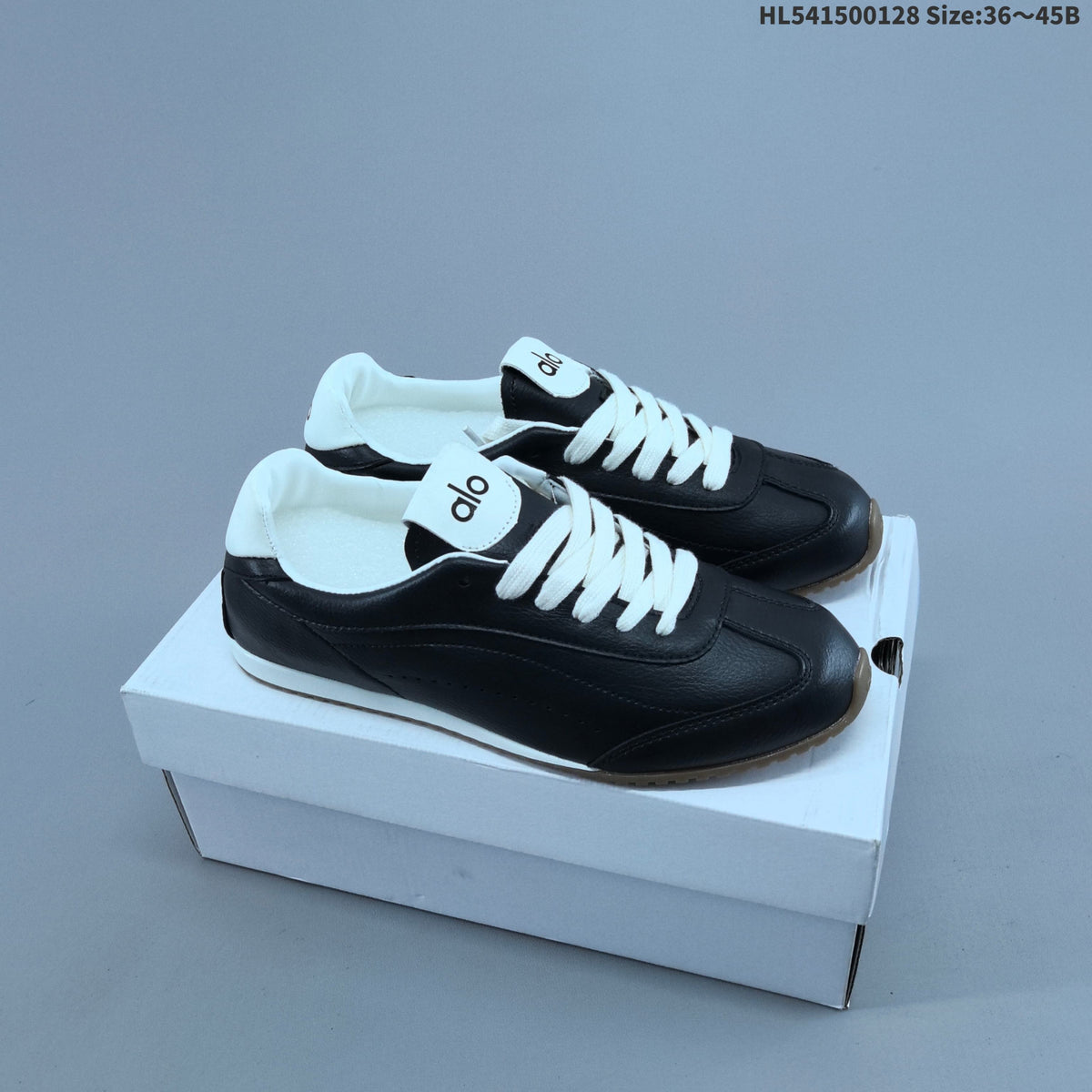 White and Black Alo Yoga Sunset Sneaker Low-Top - product image from the listing.