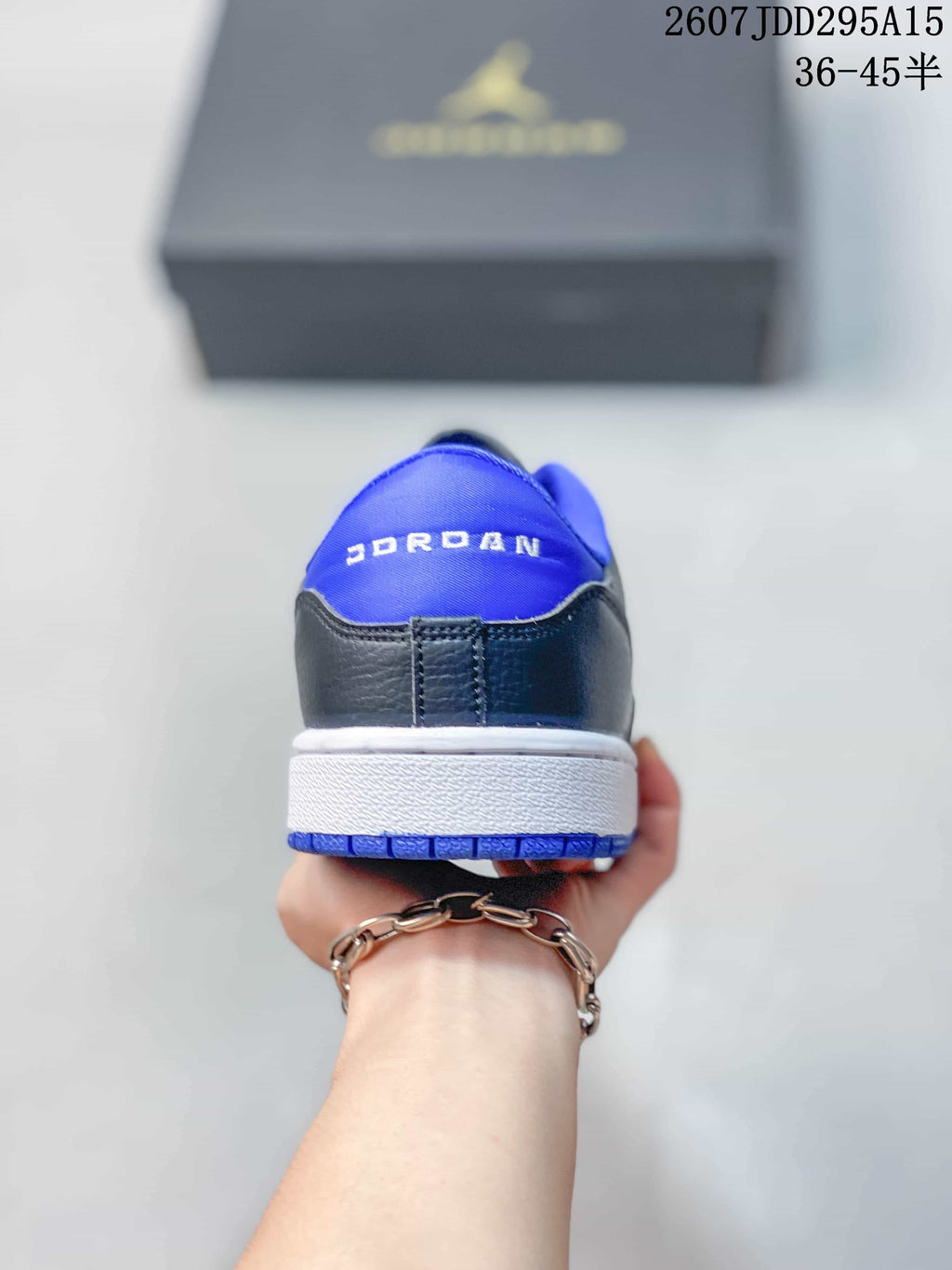 Air Jordan 1 Low Sneakers Black Blue 2607JDD295A15 - product image from the listing.