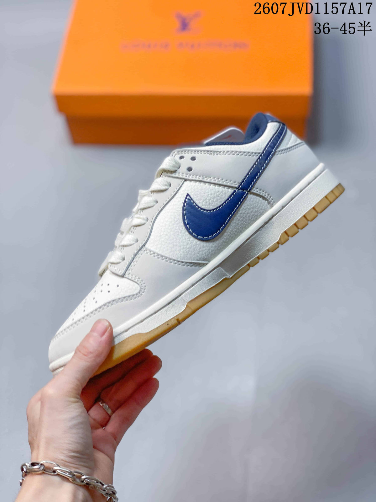 Louis Vuitton x Nike Dunk Low Sneakers in White Navy - product image from the listing.