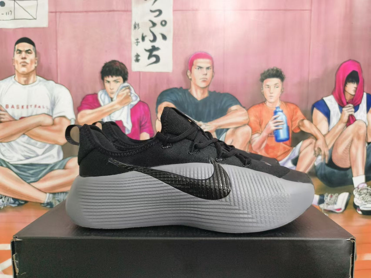 Nike Basketball Sneakers in Black and Grey - product image from the listing.