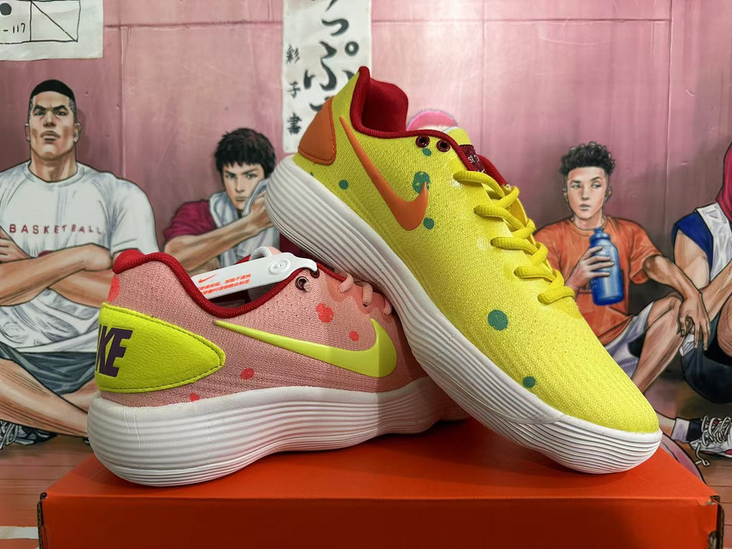 Pink and Volt Yellow Nike Basketball Shoes - product image from the listing.