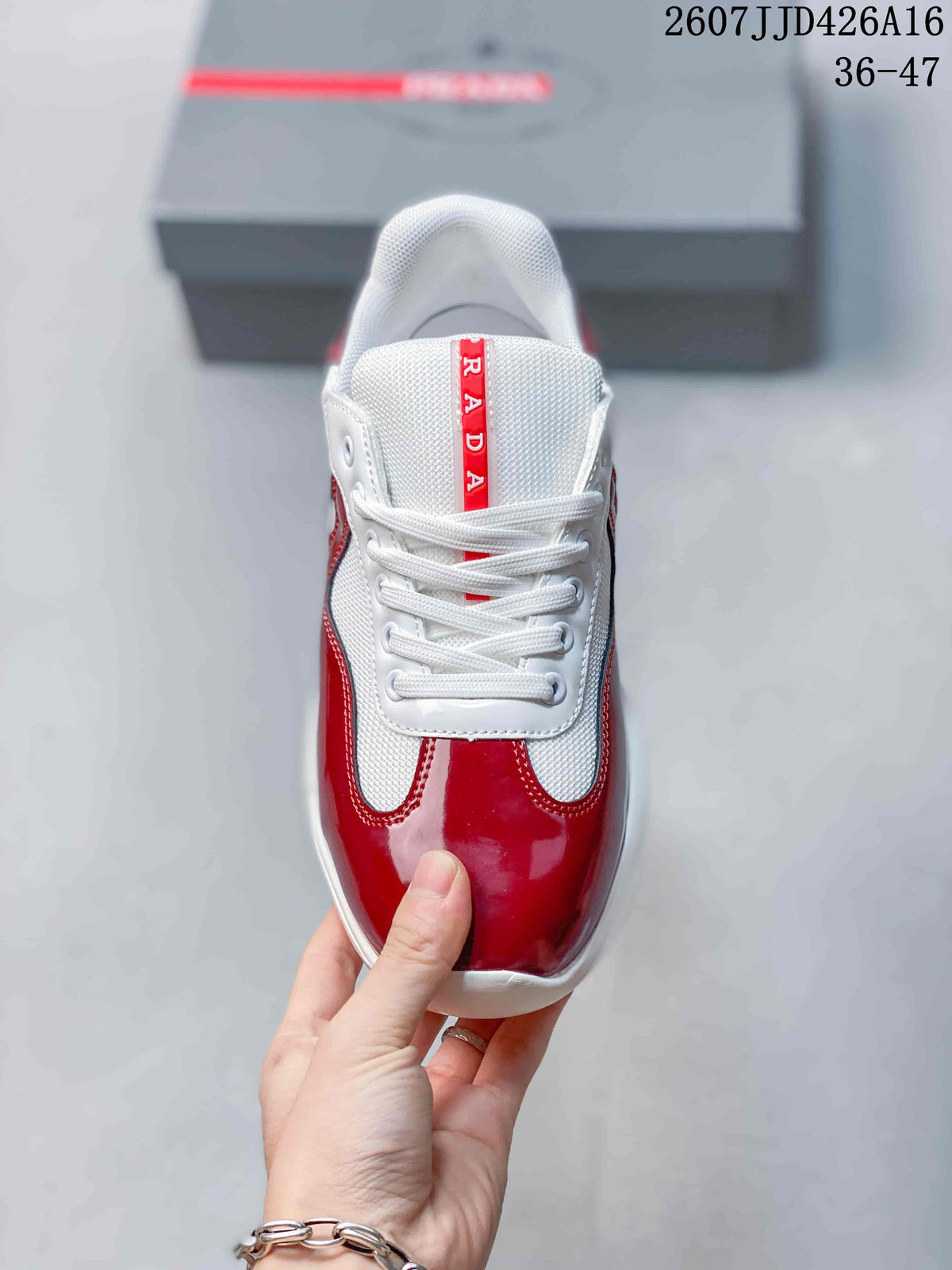 Prada 2607JJD426A16 Red and White Platform Trainers - product image from the listing.