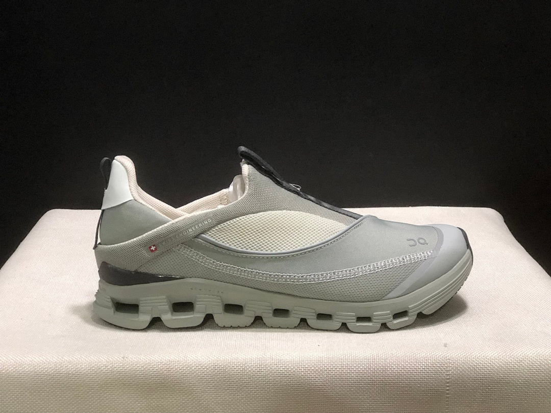 On Cloud 4 Coast Slip-On Sneakers, in Dark Grey - product image from the listing.