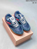 Miu Miu Gymnasium Low-Top Sneakers in Navy Red 2607JYD625A15 - product image from the listing.