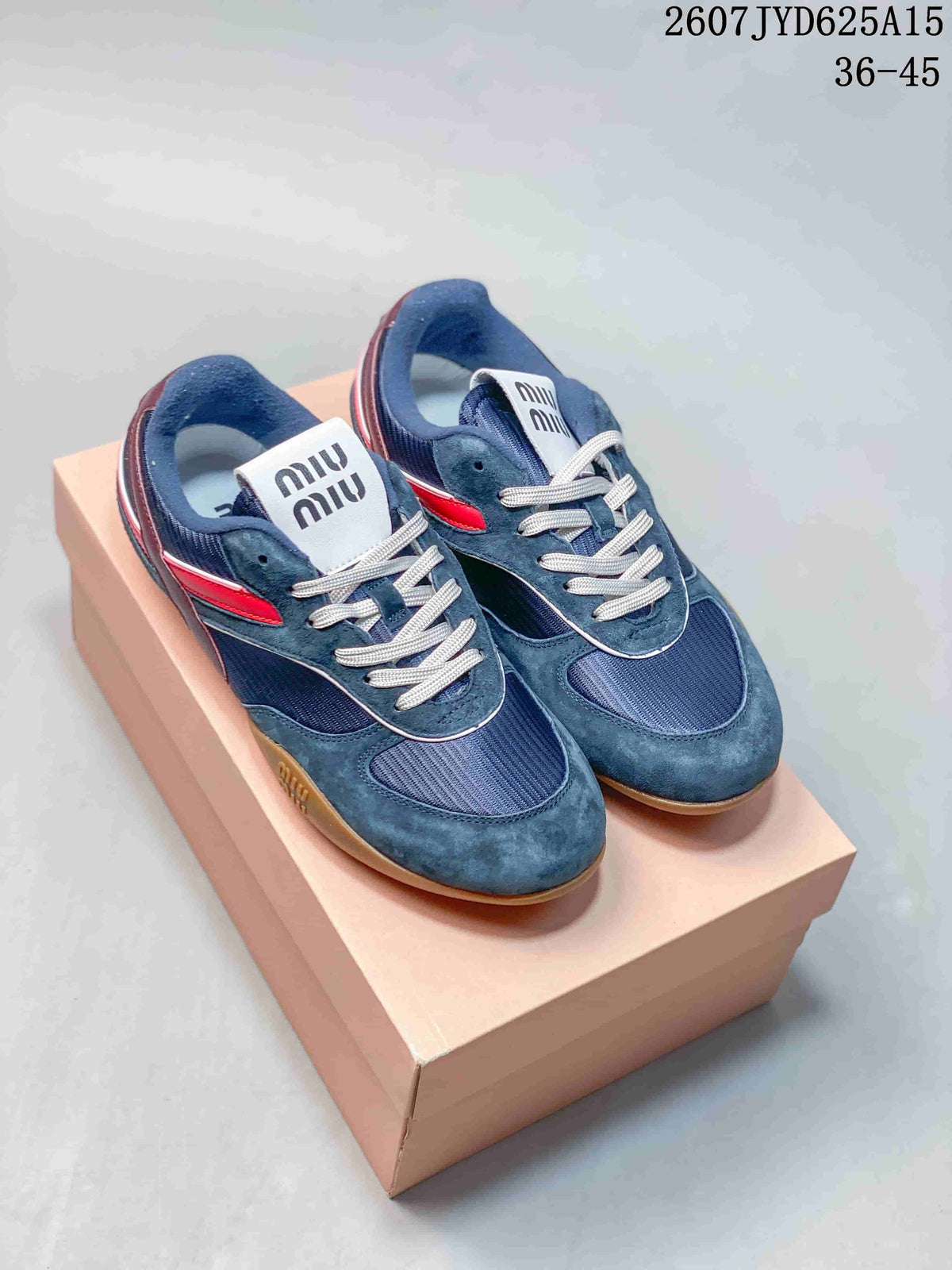 Miu Miu Gymnasium Low-Top Sneakers in Navy Red 2607JYD625A15 - product image from the listing.