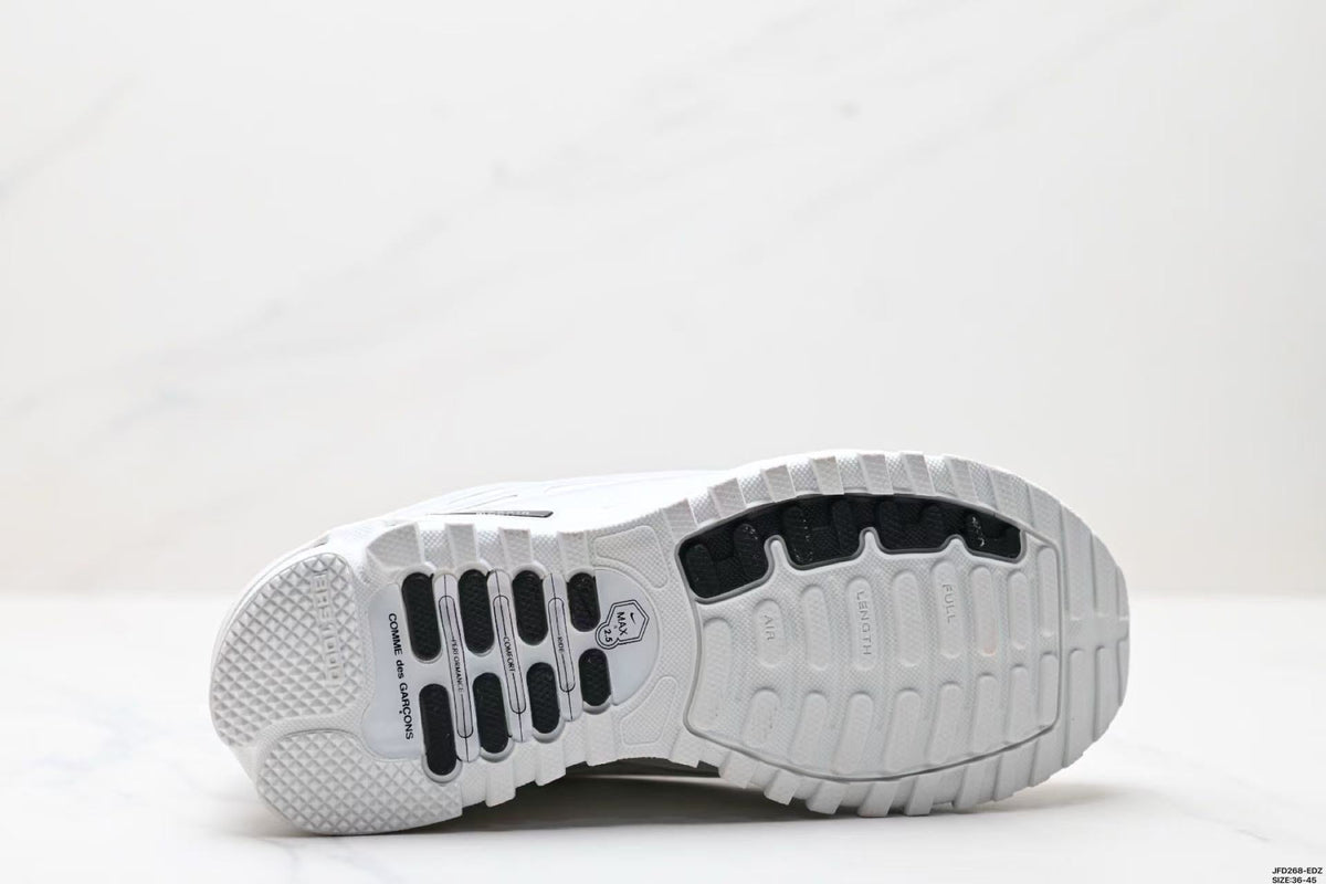 Nike Air Max Plus Comme des Garçons Sneakers in White - product image from the listing.